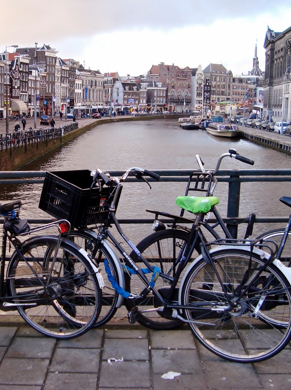 Bikes by Rokin Canal viewed from Doelensluis, Amsterdam, The Netherlands